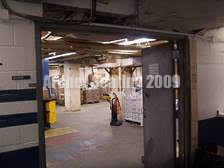 the storage room under the stands behind first base
